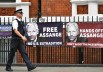 free-assange-sign-ap-img-1024x645